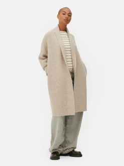 Chaqueta Larga De Punto Con Cuello Esmoquin