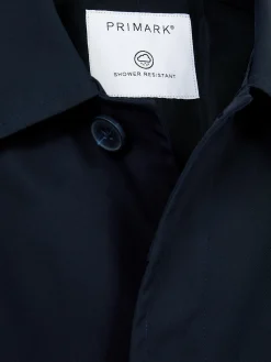 Impermeable Largo Con Botonadura Sencilla