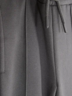 Joggers De Pernera Ancha Con Cordón De Ajuste