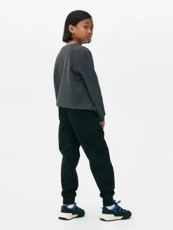 Joggers De Popelina Con Bajos Ajustados