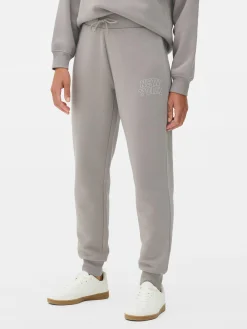 Pantalones De Chándal Pitillo Con Estampado Gráfico