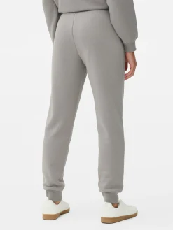 Pantalones De Chándal Pitillo Con Estampado Gráfico